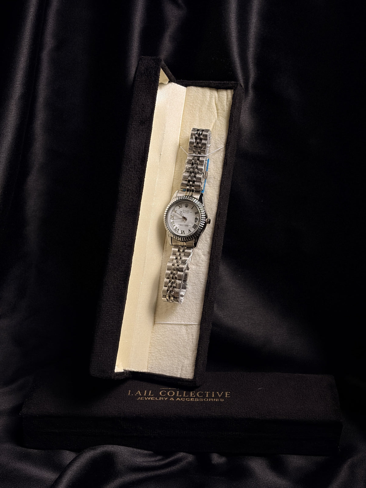 Rolex Mini Silver Watch